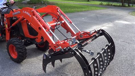 The compact design minimizes weight while preserving lift capacity. . Grapple for kubota tractor
